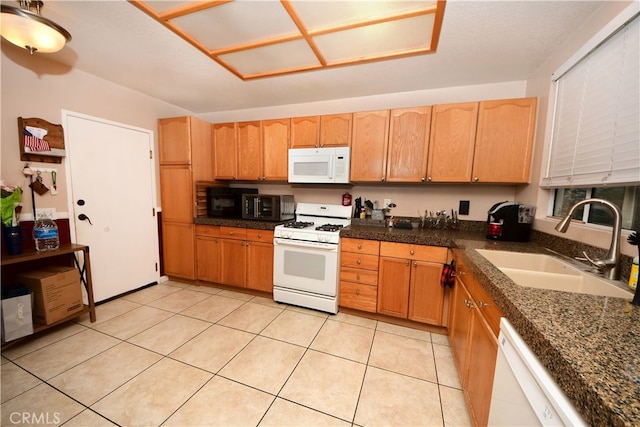 3509 E Berkshire Ct Unit C, Orange, CA 92869 - kitchen featuring white appliances, a sink, dark countertops, and light tile patterned flooring