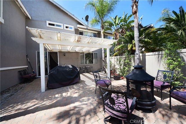 3509 E Berkshire Ct Unit C, Orange, CA 92869 - view of patio featuring area for grilling, fence, and a pergola