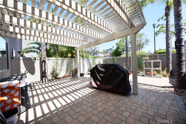 3509 E Berkshire Ct Unit C, Orange, CA 92869 - view of patio / terrace with grilling area, a fenced backyard, and a pergola
