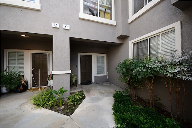 3509 E Berkshire Ct Unit C, Orange, CA 92869 - doorway to property with stucco siding