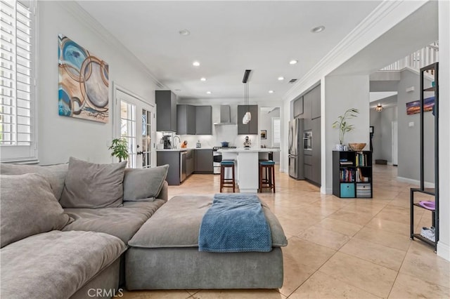 living area featuring crown molding, healthy amount of natural light, light tile patterned floors, recessed lighting, and baseboards