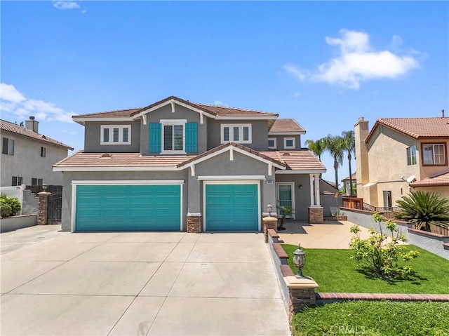 8489 Syracuse St, Riverside, CA 92508 - view of front facade featuring a garage, driveway, and stucco siding