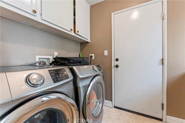 8489 Syracuse St, Riverside, CA 92508 - washroom with washing machine and clothes dryer, cabinet space, and light tile patterned floors