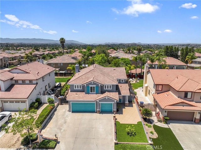 8489 Syracuse St, Riverside, CA 92508 - aerial perspective of suburban area with a mountain backdrop