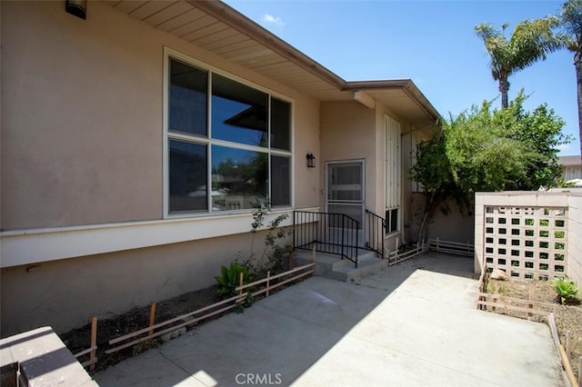 715 S Bradley Rd Unit 14, Santa Maria, CA 93454 - property entrance featuring stucco siding, a patio, and fence