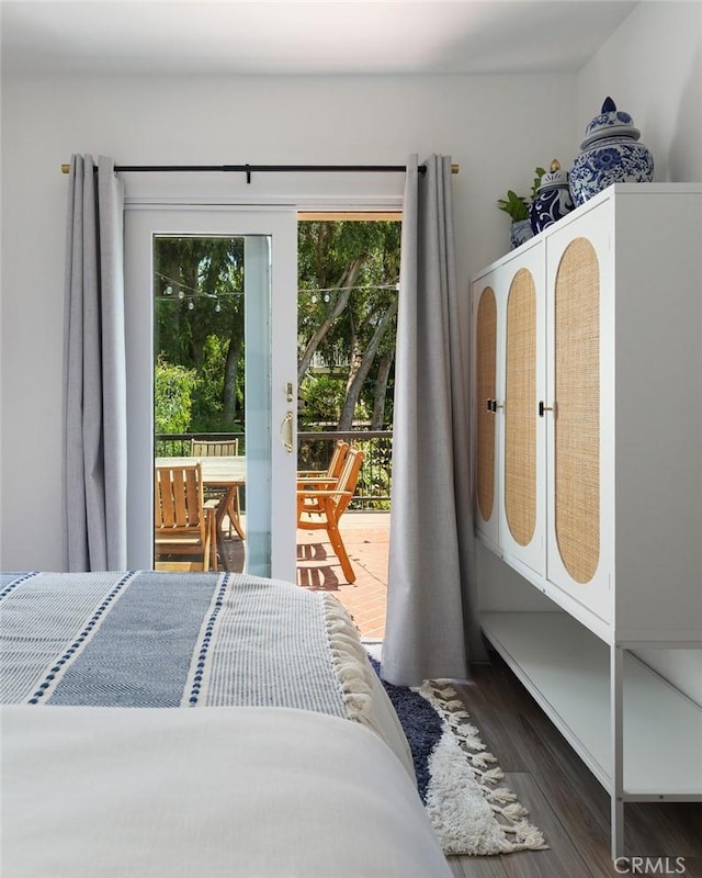 565 Lombardy Ln, Laguna Beach, CA 92651 - bedroom featuring access to exterior and wood finished floors