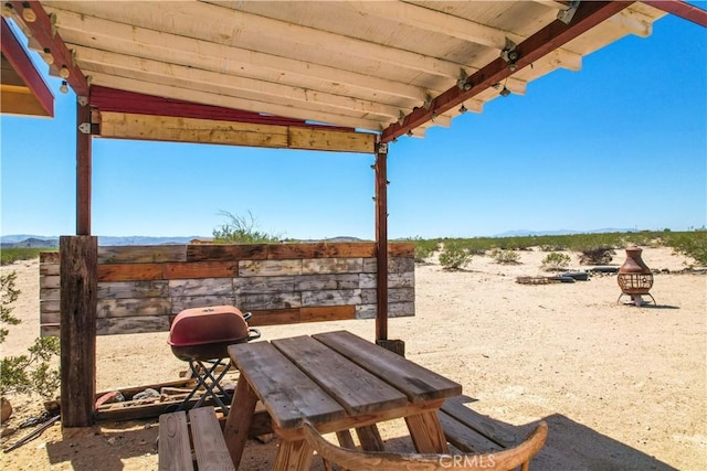 view of patio / terrace with a mountain view