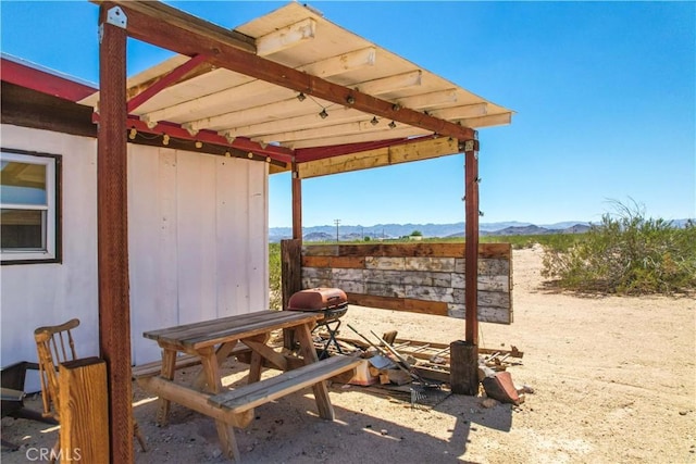 view of patio with a mountain view