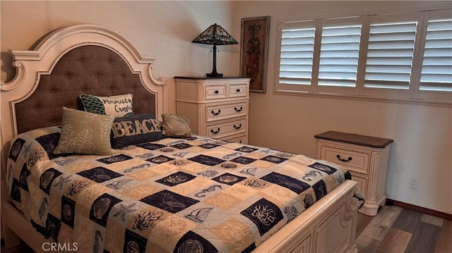1202 N Pacific St Unit 204A, Oceanside, CA 92054 - bedroom featuring wood finished floors and baseboards
