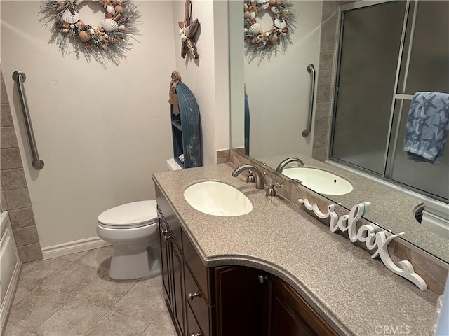 1202 N Pacific St Unit 204A, Oceanside, CA 92054 - bathroom with toilet, tile patterned flooring, vanity, and shower / bath combination with glass door