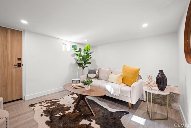 4160 Hubbard St, Los Angeles, CA 90023 - living area with wood finished floors, baseboards, and recessed lighting