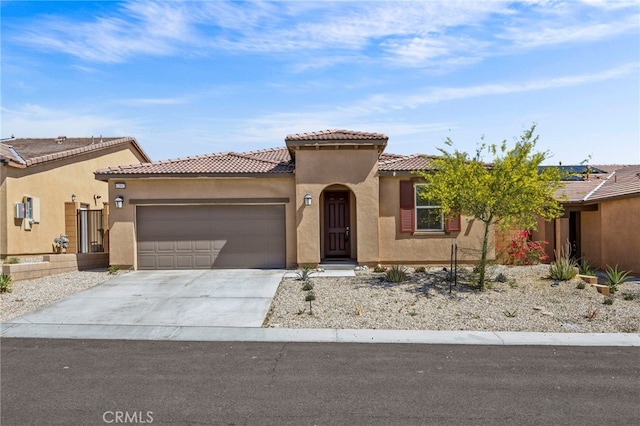 62892 Loftwood St, Desert Hot Springs, CA 92240 - view of front of house with stucco siding, a garage, concrete driveway, and a tile roof