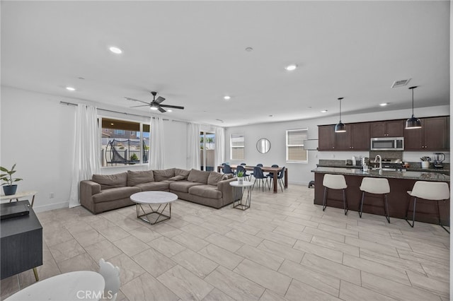 62892 Loftwood St, Desert Hot Springs, CA 92240 - living area with ceiling fan, recessed lighting, and baseboards