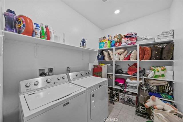 62892 Loftwood St, Desert Hot Springs, CA 92240 - clothes washing area with separate washer and dryer, light tile patterned floors, and recessed lighting