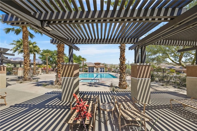 62892 Loftwood St, Desert Hot Springs, CA 92240 - view of patio featuring a pergola and a community pool