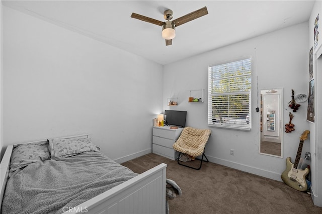62892 Loftwood St, Desert Hot Springs, CA 92240 - carpeted bedroom with baseboards and ceiling fan