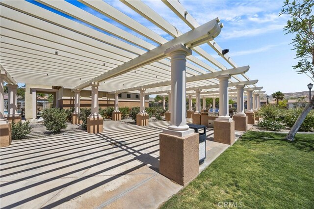 62892 Loftwood St, Desert Hot Springs, CA 92240 - view of patio featuring a pergola