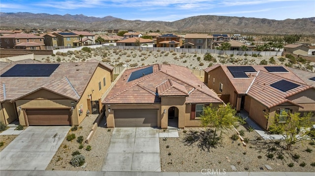 62892 Loftwood St, Desert Hot Springs, CA 92240 - aerial perspective of suburban area featuring a mountainous background