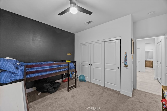 62892 Loftwood St, Desert Hot Springs, CA 92240 - bedroom featuring light carpet, a closet, and ceiling fan