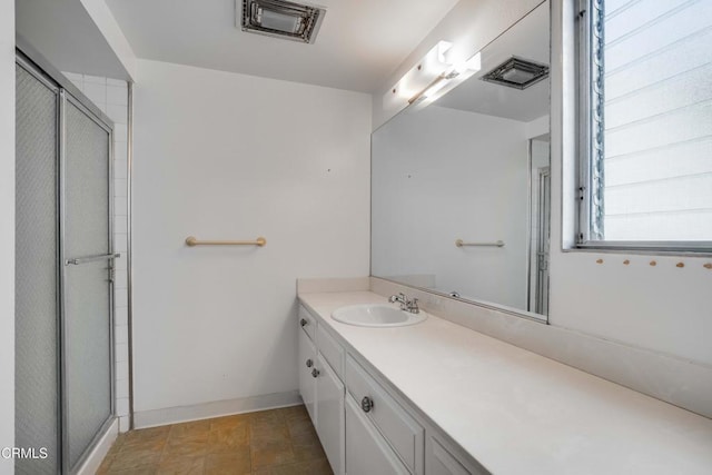 4213 Sarah St Unit 22, Burbank, CA 91505 - bathroom with an enclosed shower, vanity, and baseboards