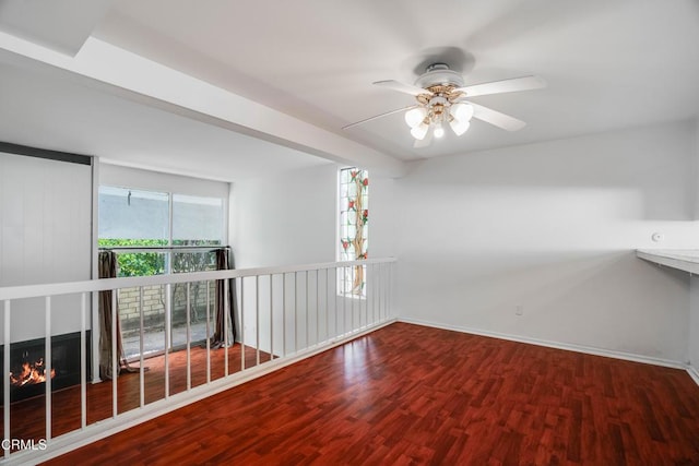 4213 Sarah St Unit 22, Burbank, CA 91505 - empty room with wood finished floors, ceiling fan, and baseboards