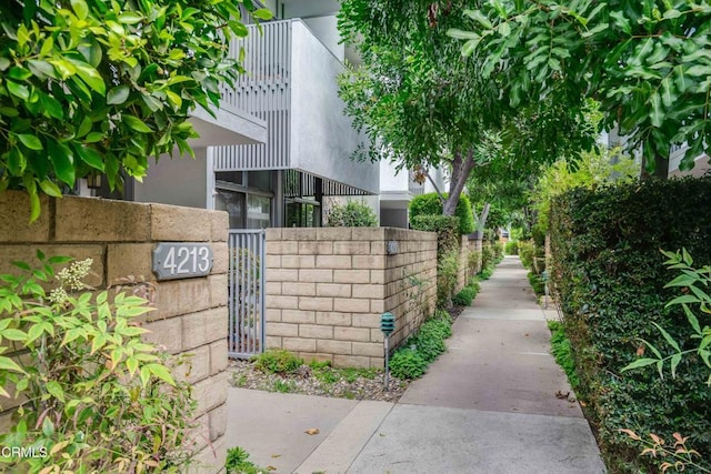 4213 Sarah St Unit 22, Burbank, CA 91505 - view of property exterior with fence and stucco siding