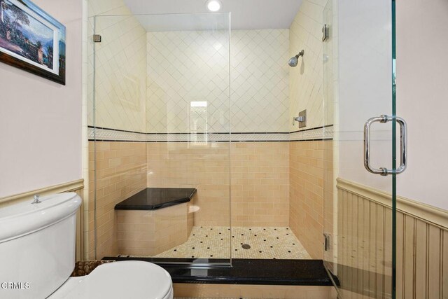 670 San Marino Ave, San Marino, CA 91108 - full bathroom with a stall shower and wainscoting