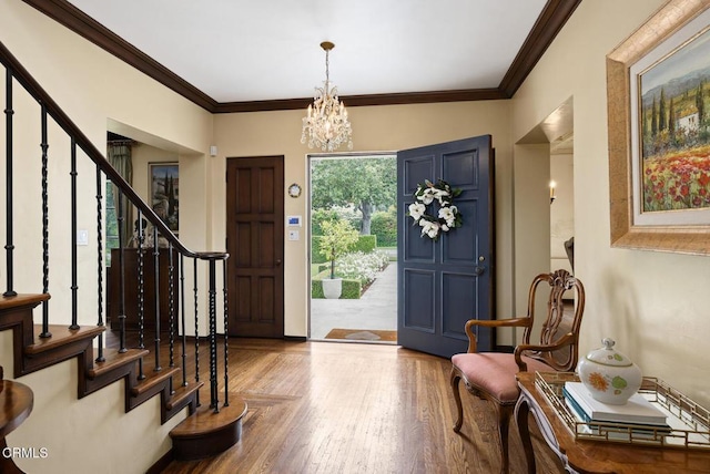 670 San Marino Ave, San Marino, CA 91108 - foyer entrance with stairs, a chandelier, wood finished floors, and ornamental molding