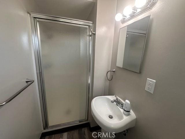 410 Orange Ave, Los Banos, CA 93635 - full bath with a stall shower and wood finished floors