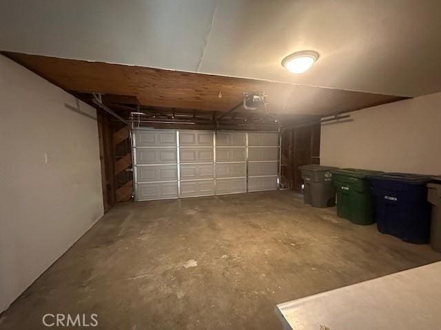 410 Orange Ave, Los Banos, CA 93635 - garage with a garage door opener