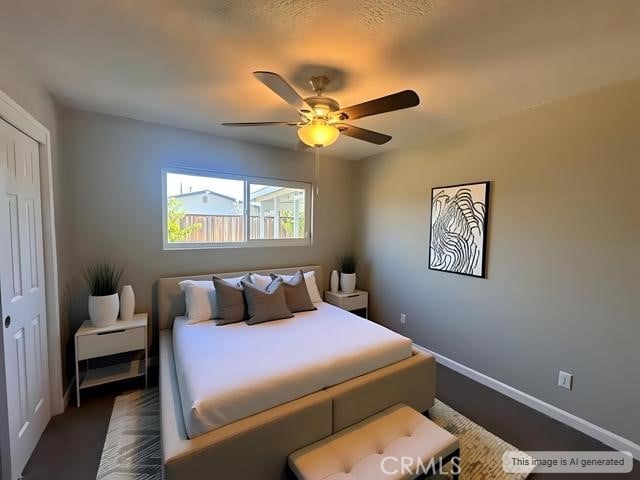410 Orange Ave, Los Banos, CA 93635 - bedroom with a closet and ceiling fan