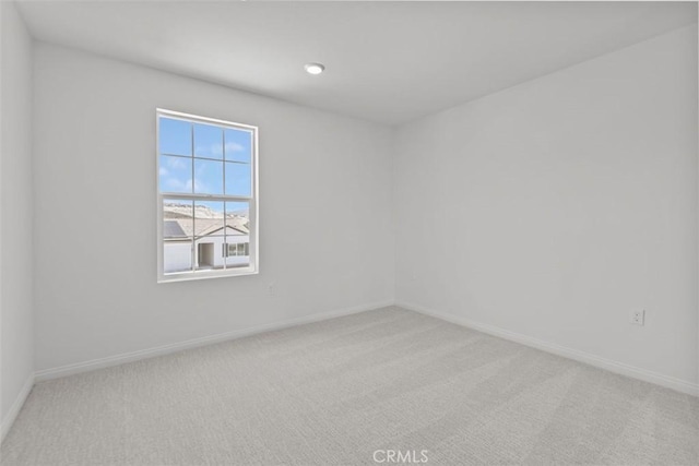908 Ancona Ln, Lake Elsinore, CA 92530 - spare room featuring light colored carpet and baseboards