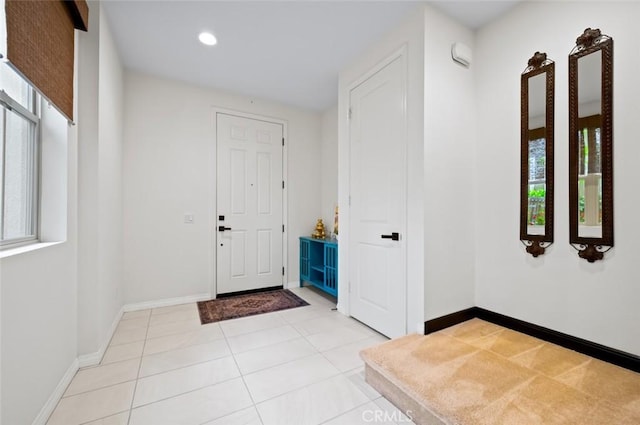 126 Brambles, Irvine, CA 92618 - foyer entrance featuring plenty of natural light, baseboards, recessed lighting, and light tile patterned floors