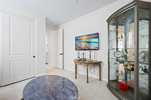 126 Brambles, Irvine, CA 92618 - sitting room featuring light tile patterned floors and baseboards