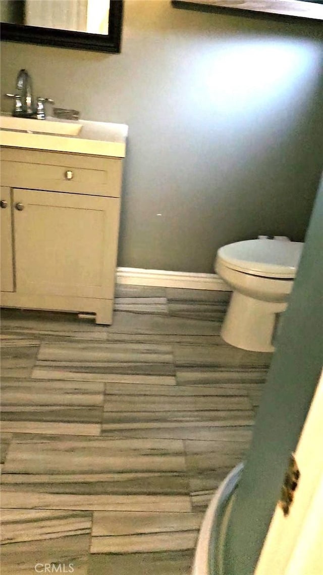 3350 Linda Vis, Los Angeles, CA 90032 - bathroom with vanity, toilet, and baseboards