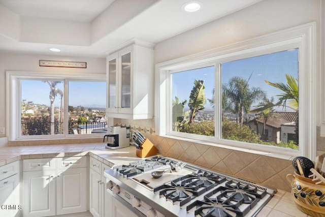 307 Artemesia Ave, Ventura, CA 93001 - kitchen featuring tile counters, glass insert cabinets, white cabinets, stovetop, and recessed lighting