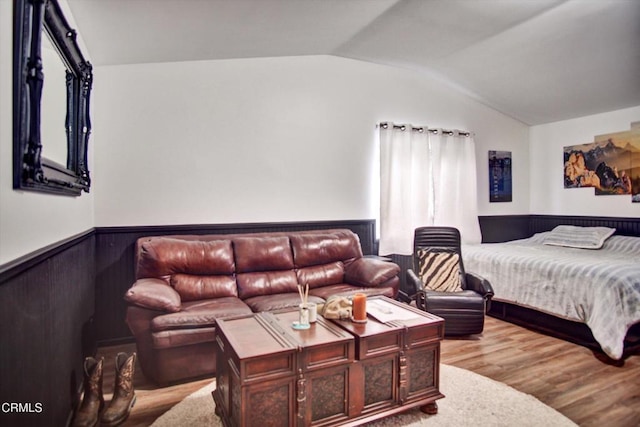 5500 Casitas Pass Rd, Ventura, CA 93001 - bedroom featuring wainscoting, lofted ceiling, and wood finished floors