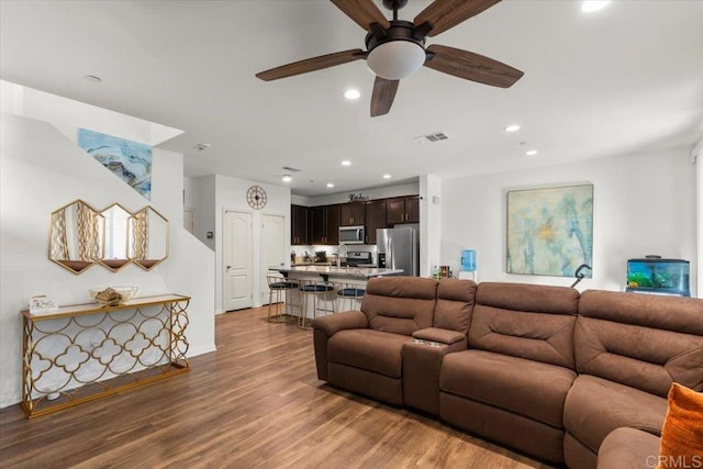 861 Colton Ave, Colton, CA 92324 - living area featuring recessed lighting, ceiling fan, wood finished floors, and baseboards