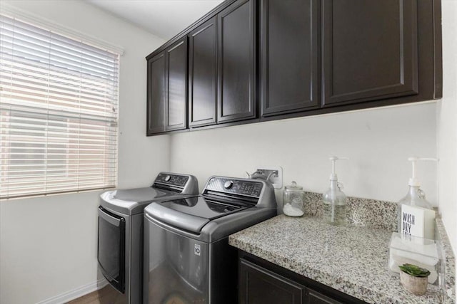 861 Colton Ave, Colton, CA 92324 - laundry room with cabinet space, washer and dryer, and baseboards