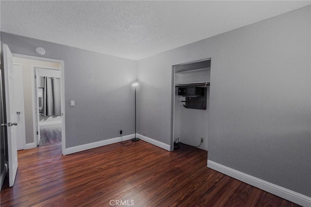 5805 Vista Del Cerro, Oroville, CA 95966 - spare room with wood finished floors, baseboards, and a textured ceiling