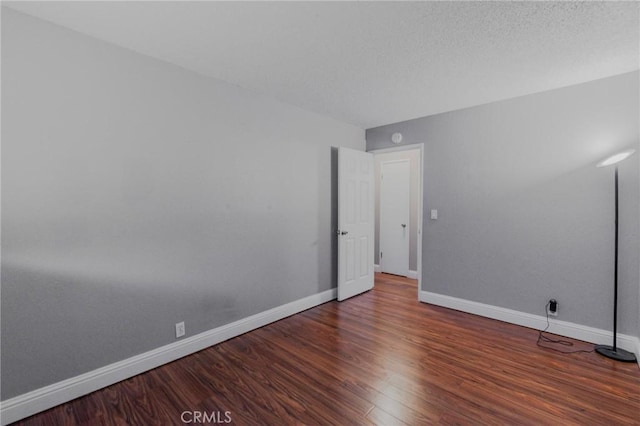 5805 Vista Del Cerro, Oroville, CA 95966 - spare room featuring baseboards and wood finished floors
