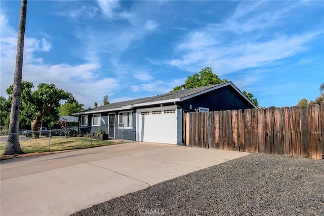 5805 Vista Del Cerro, Oroville, CA 95966 - ranch-style home with an attached garage, concrete driveway, and fence
