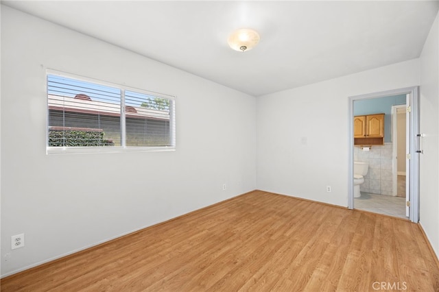 10441 La Mirada Blvd, Whittier, CA 90604 - empty room featuring light wood finished floors