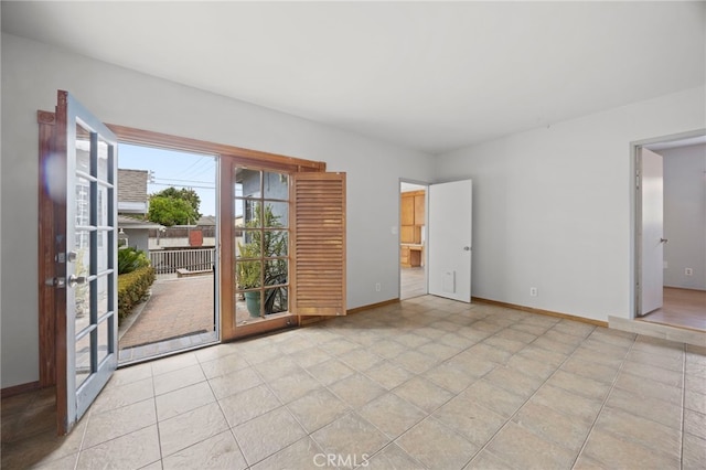 10441 La Mirada Blvd, Whittier, CA 90604 - spare room with baseboards and light tile patterned floors