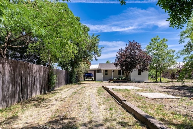 3080 State Highway 45, Glenn, CA 95943 - rear view of property with driveway and fence