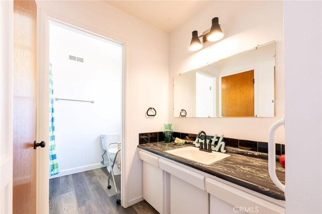 3080 State Highway 45, Glenn, CA 95943 - bathroom with wood finished floors and vanity
