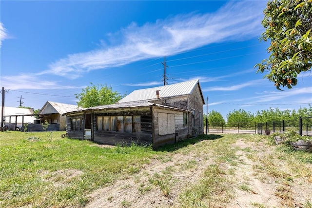3080 State Highway 45, Glenn, CA 95943 - view of side of property featuring fence and metal roof