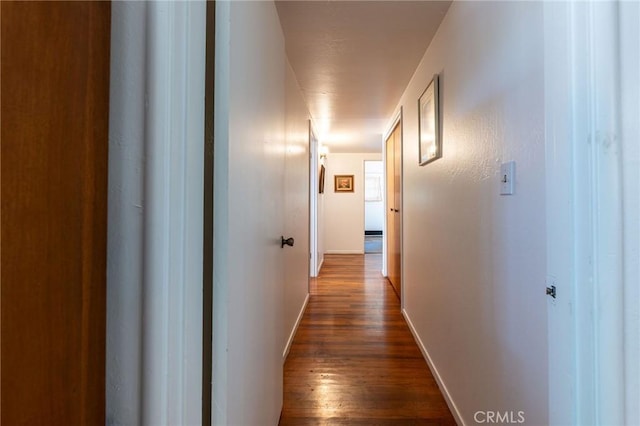 3080 State Highway 45, Glenn, CA 95943 - corridor featuring dark wood-style floors and baseboards