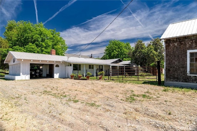 3080 State Highway 45, Glenn, CA 95943 - back of house featuring fence and a chimney