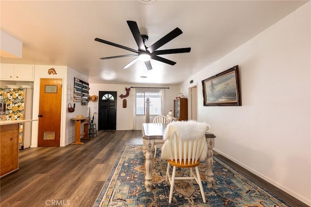 3080 State Highway 45, Glenn, CA 95943 - dining room featuring dark wood-style flooring, a ceiling fan, and baseboards